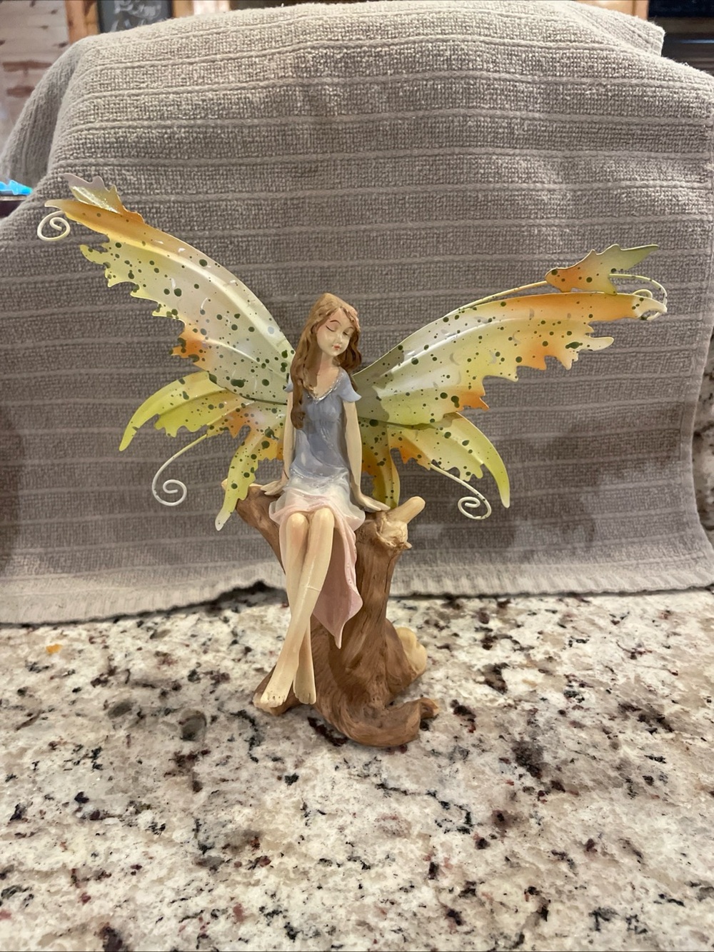 Hand-Painted Fairy Figurine with Green and Yellow Wings